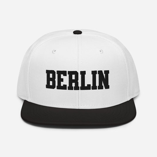 Front view of Berlin Germany embroidered snapback hat with flat visor
