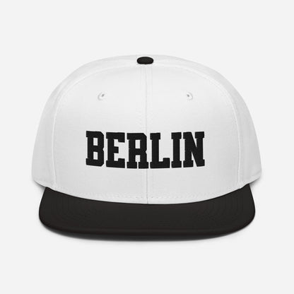 Front view of Berlin Germany embroidered snapback hat with flat visor